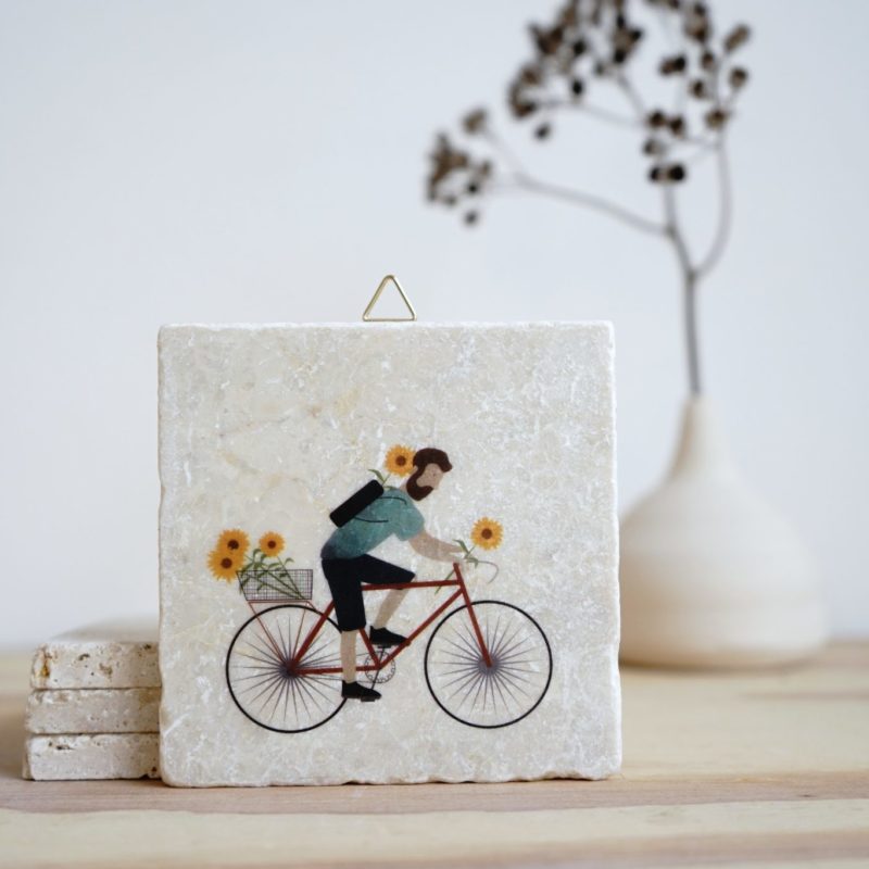 Steinfliese Radler Blumen